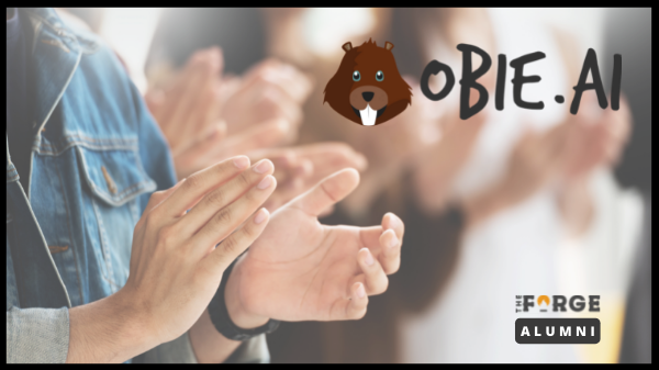 Obie logo and clapping for award