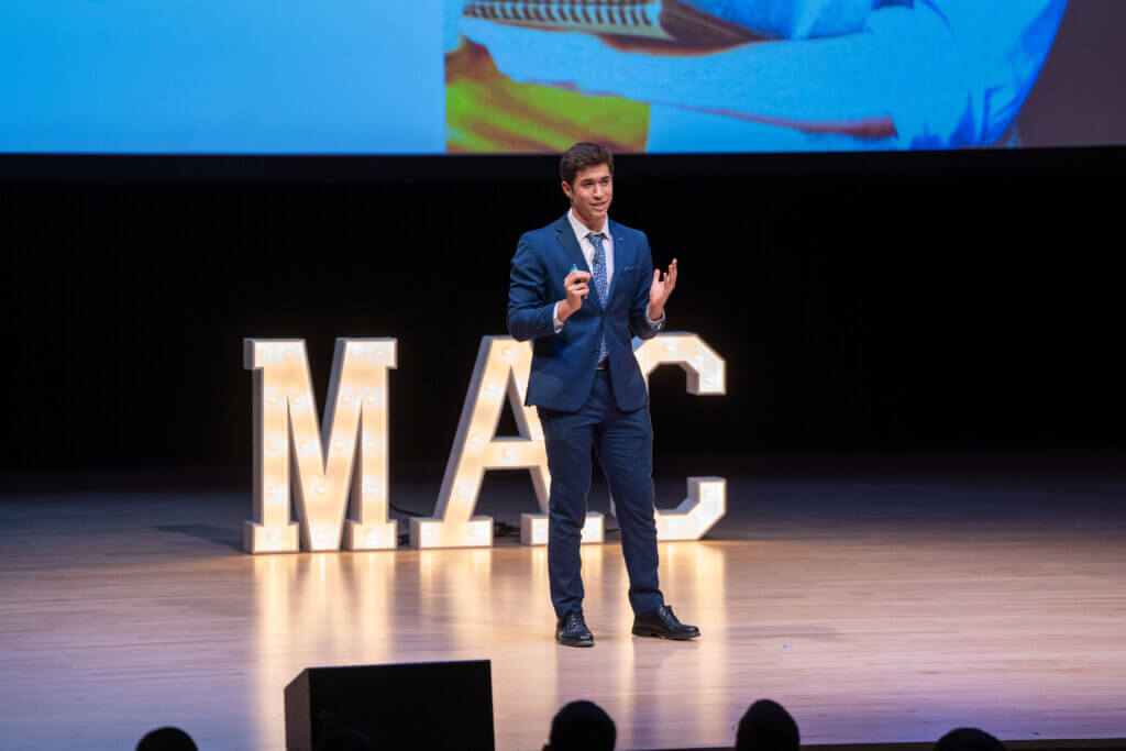 Person pitching on a stage